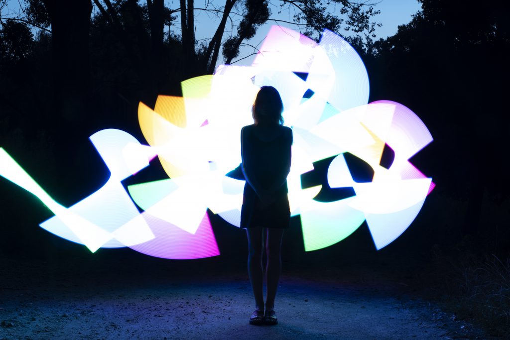 woman-with-colorful-lights-full-shot-1024x683